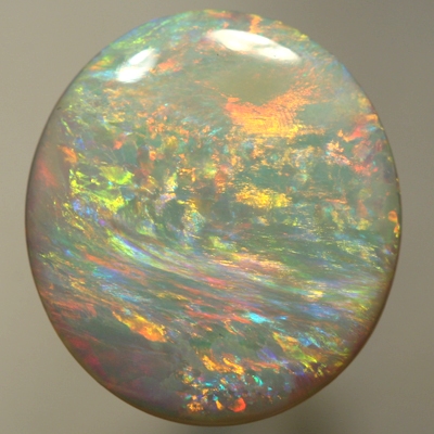 SOLID SEMI BLACK OPAL Bright orange and gold yellow in large rolling flashes. SEE VIDEO